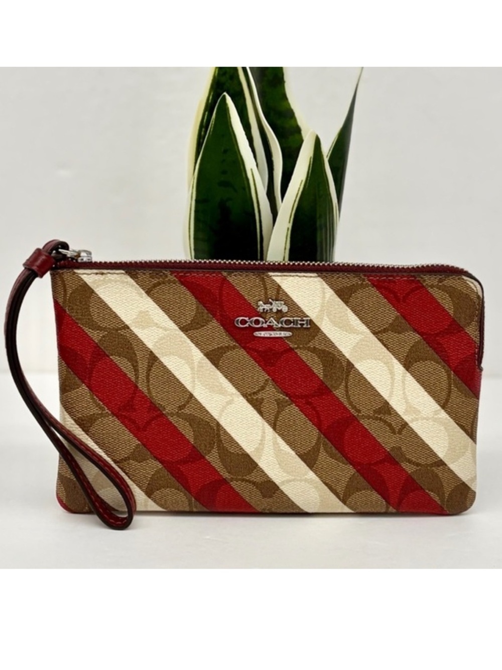 Large Corner Zip Wristlet In Signature Canvas With Diagonal Stripe Print